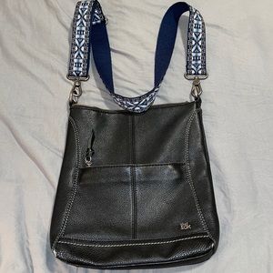 Well used SAK crossbody.  One of my favorite mom bags to go to.  Super spacious!